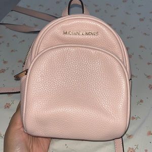 Micheal Kors Rhea Mini Backpack ( FAIRLY NEW)